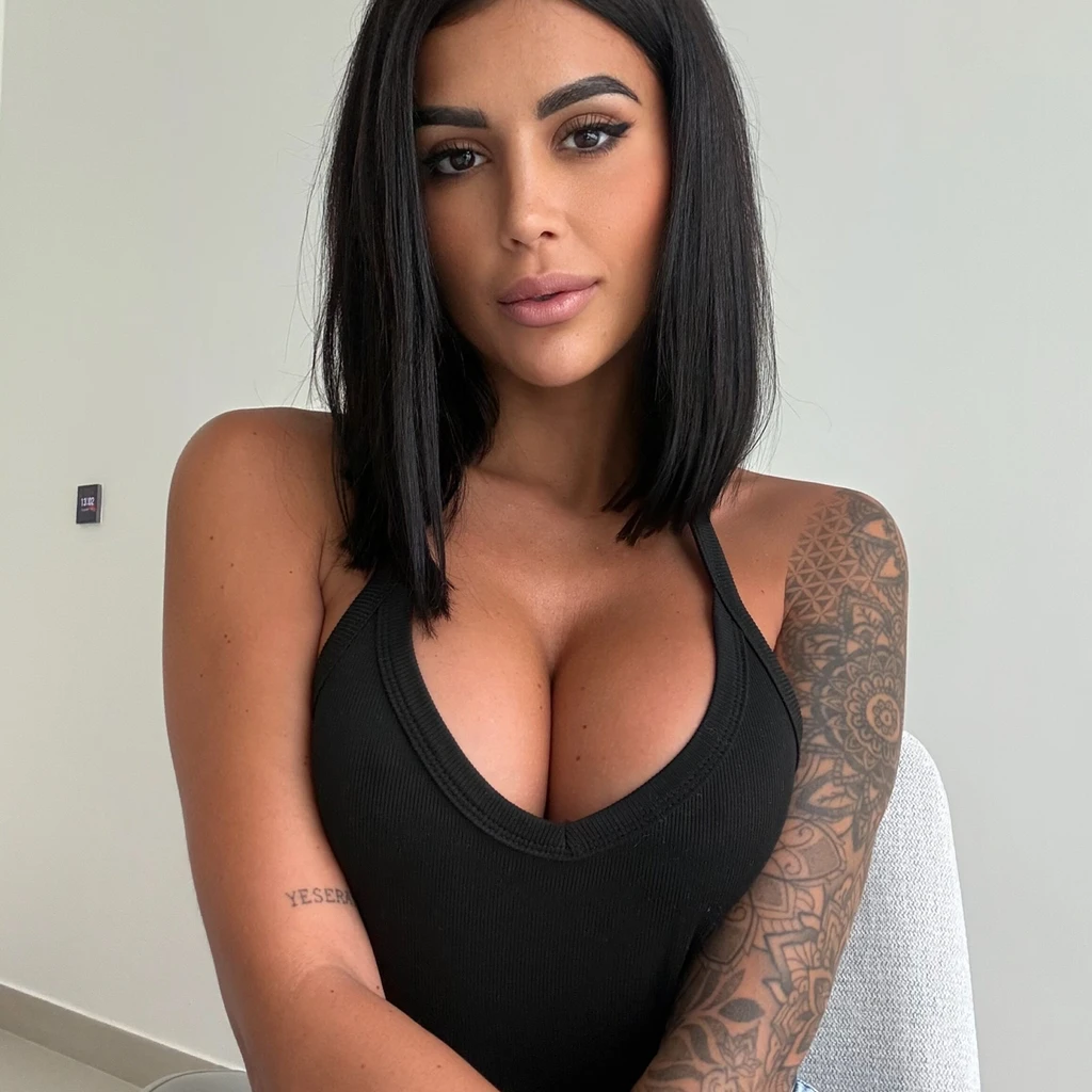 GINA AMIRA